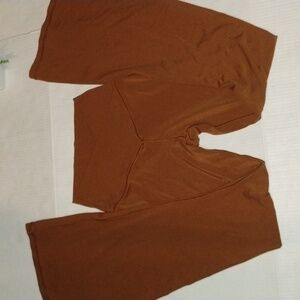 Aerie Offline Flare Leg Leggings. Womens Medium. Rust/Brown in color.